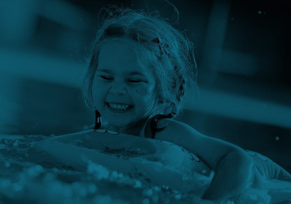 little girl swimming